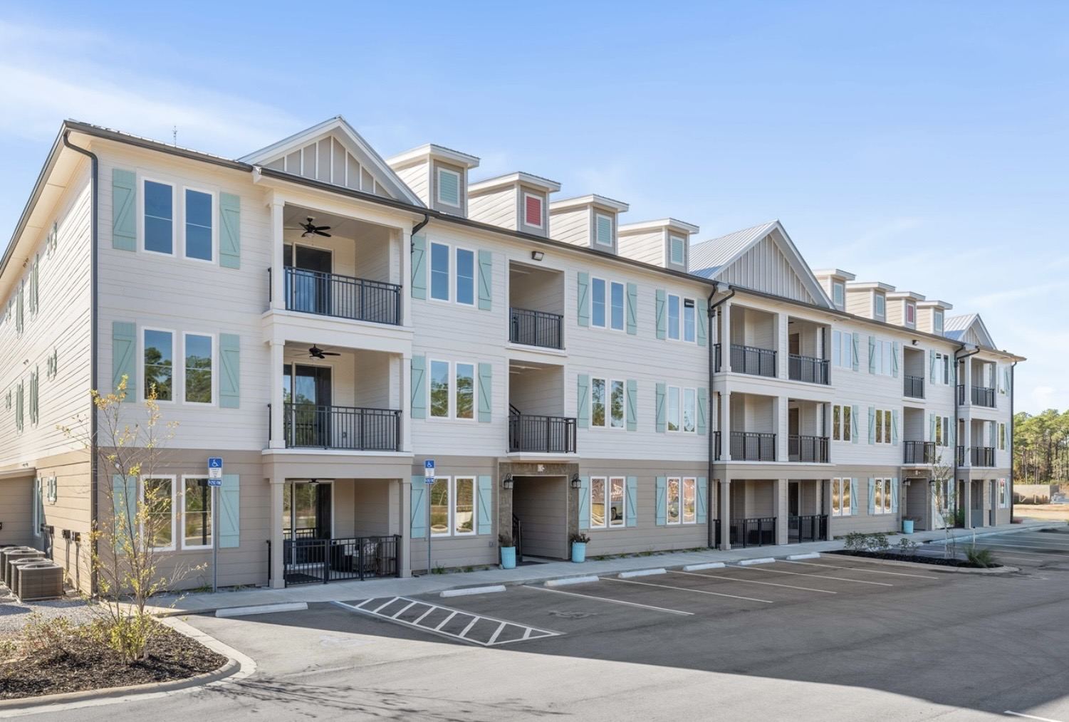 Coral and Cove condo building located next to Point Preserve